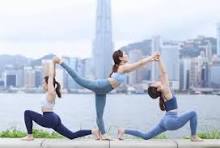 Three person yoga pose